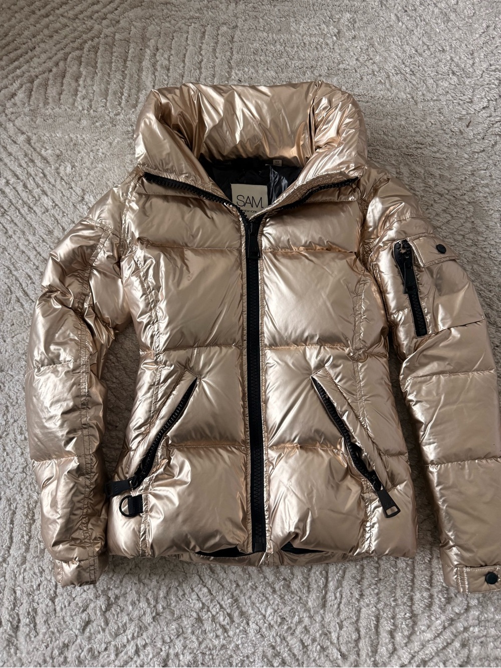 SAM. Metallic Champagne Puffer Jacket with Black Trim